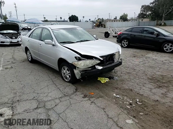 2005 Toyota Camry LE with VIN 4T1BF32KX5U601192, listed as a Copart auction lot 55365485 with 153,251 mi miles and Salvage Title. Bid and sale history available at DreamBid. Image 14.