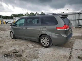 2011 Toyota Sienna XLE AAS with VIN 5TDYK3DC9BS120799, listed as a Copart auction lot 61470045 with 194,422 mi miles and Salvage title. Bid and sale history available at DreamBid. Image 2.