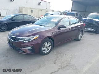 2019 Kia Optima LX with VIN 5XXGT4L36KG284965, listed as a IAAI auction lot 40374239 with 64,351 mi miles. Bid and sale history available at carsss.com. Image 2.
