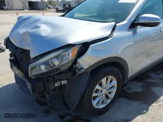 2016 Kia Sorento LX with VIN 5XYPG4A35GG044946, listed as a IAAI auction lot 41854811 with 146,422 mi miles. Bid and sale history available at carsss.com. Image 6.