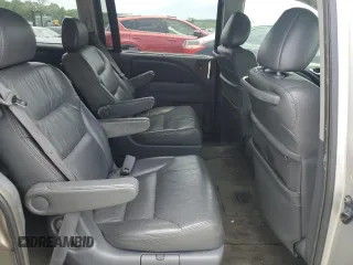 2006 Honda Odyssey Touring z VIN 5FNRL38886B000011, wystawiony jako Copart lot #57399225 z przebiegiem 256 217 mil mil oraz Szkoda całkowita • Salvage title. Historia ofert i sprzedaży dostępna na DreamBid. Obrazek 11.