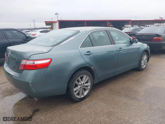 2007 Toyota Camry CE with VIN 4T1BE46K97U607748, listed as a IAAI auction lot 41566753 with 264,374 mi miles. Bid and sale history available at carsss.com. Image 4.