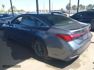 2019 Toyota Avalon Hybrid Limited with VIN 4T1B21FB4KU005887, listed as a IAAI auction lot 42014462 with 141,213 mi miles. Bid and sale history available at carsss.com. Image 3.