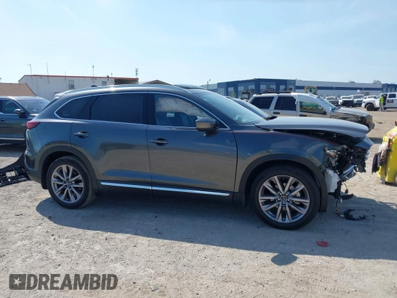 2020 Mazda CX-9 Grand Touring z VIN JM3TCADY8L0417775, wystawiony jako IAAI lot #42306864 z przebiegiem 35 287 mil mil oraz . Historia ofert i sprzedaży dostępna na DreamBid. Obrazek 14.