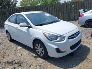 2013 Hyundai Accent GLS with VIN KMHCT4AEXDU532291, listed as a IAAI auction lot 42115374 with 179,848 mi miles. Bid and sale history available at carsss.com. Image 1.