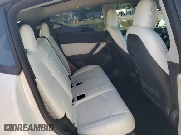 2022 Tesla Model Y Long Range with VIN 7SAYGDEE1NF339663, listed as a Copart auction lot 49771965 with 33,734 mi miles and Salvage Title. Bid and sale history available at carsss.com. Image 11.