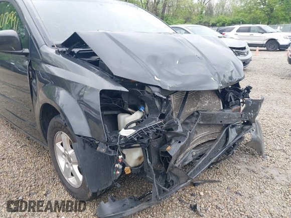 2012 Dodge Grand Caravan SXT with VIN 2C4RDGCG7CR236328, listed as a IAAI auction lot 42170991 with 72,831 mi miles and . Bid and sale history available at DreamBid. Image 18.