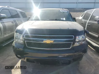 2014 Chevrolet Suburban LT with VIN 1GNSKJE71ER227075, listed as a Copart auction lot 76675654 with 214,113 mi miles and Salvage Title. Bid and sale history available at DreamBid. Image 5.