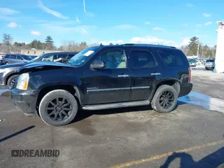 2014 GMC Yukon Denali with VIN 1GKS2EEF9ER140584, listed as a IAAI auction lot 41688659 with 81,995 mi miles. Bid and sale history available at carsss.com. Image 14.