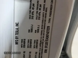 2019 Tesla Model 3 Mid Range z VIN 5YJ3E1EA3KF427229, wystawiony jako Copart lot #60881305 z przebiegiem 78 975 mil mil oraz Czysty tytuł • Clean title. Historia ofert i sprzedaży dostępna na DreamBid. Obrazek 12.