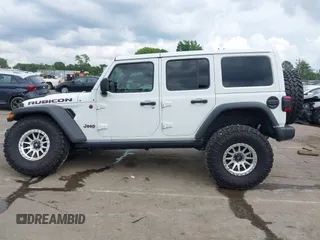 2021 Jeep Wrangler Unlimited Rubicon with VIN 1C4HJXFG7MW527498, listed as a IAAI auction lot 42393520 with 18,085 mi miles and . Bid and sale history available at DreamBid. Image 14.