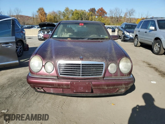 1998 Mercedes-Benz E with VIN WDBJF70F1WA503781, listed as a Copart auction lot 77284784 with Not Provided miles and Clean Title. Bid and sale history available at DreamBid. Image 5.