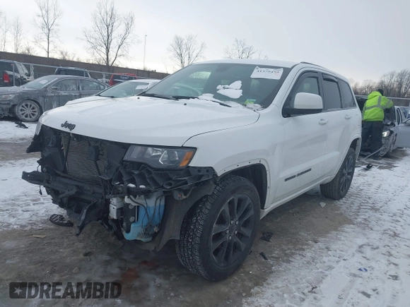 2018 Jeep Grand Cherokee Laredo E with VIN 1C4RJFAG1JC499457, listed as a IAAI auction lot 41379459 with 127,344 mi miles and . Bid and sale history available at DreamBid. Image 2.