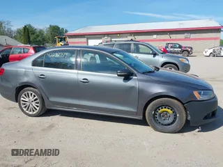 2012 Volkswagen Jetta SEL с VIN 3VWLX7AJ4CM471141, выставлен на аукционе IAAI как лот 42276054 с пробегом 143 196 миль миль и . История ставок и продаж доступна на DreamBid. Изображение 14.