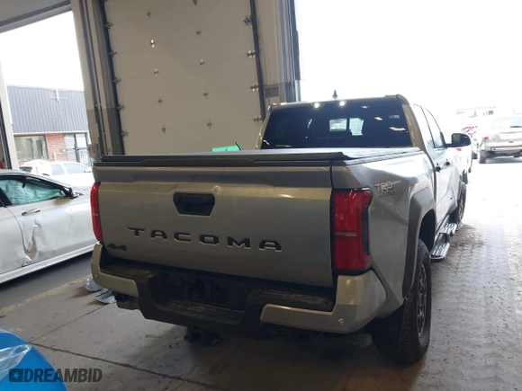 2024 Toyota Tacoma 4WD SR5 with VIN 3TMLB5JN4RM071338, listed as a IAAI auction lot 41742236 with 9,367 mi miles. Bid and sale history available at carsss.com. Image 16.