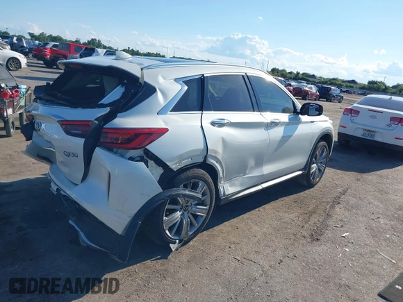2020 Infiniti QX50 Luxe with VIN 3PCAJ5M15LF120478, listed as a IAAI auction lot 42212236 with 85,851 mi miles and . Bid and sale history available at DreamBid. Image 4.