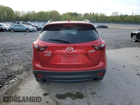 2016 Mazda CX-5 Grand Touring with VIN JM3KE4DY6G0753826, listed as a Copart auction lot 55391555 with 96,852 mi miles and Salvage Title. Bid and sale history available at DreamBid. Image 6.