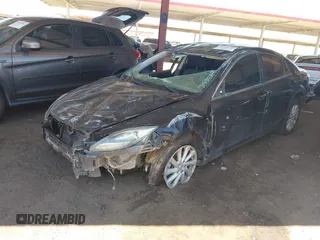 2013 Mazda 6 i Touring with VIN 1YVHZ8DH0D5M15653, listed as a IAAI auction lot 42564249 with 142,173 mi miles and . Bid and sale history available at DreamBid. Image 2.