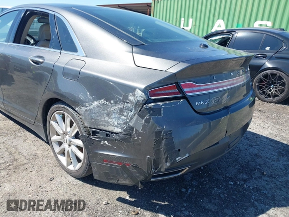 2016 Lincoln MKZ z VIN 3LN6L2G90GR632116, wystawiony jako IAAI lot #41836442 z przebiegiem 121 223 mil mil oraz . Historia ofert i sprzedaży dostępna na DreamBid. Obrazek 6.
