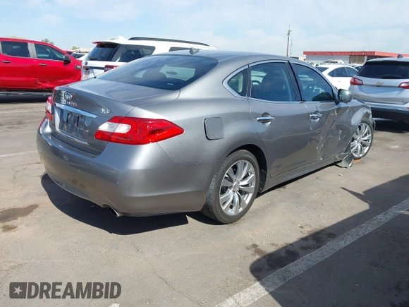 2013 Infiniti M37 with VIN JN1BY1AP3DM514462, listed as a IAAI auction lot 42141542 with 175,403 mi miles. Bid and sale history available at carsss.com. Image 4.