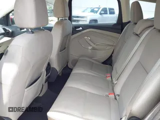 2017 Ford Escape SE z VIN 1FMCU0G95HUE86116, wystawiony jako IAAI lot #42397021 z przebiegiem 115 573 mil mil oraz . Historia ofert i sprzedaży dostępna na DreamBid. Obrazek 8.