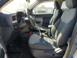 2023 Ford Maverick XL z VIN 3FTTW8E34PRA36653, wystawiony jako Copart lot #52192715 z przebiegiem 13 586 mil mil oraz Szkody całkowita. Historia ofert i sprzedaży dostępna na DreamBid. Obrazek 7.
