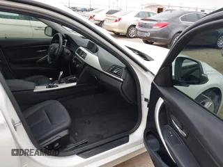 2015 BMW 3 Series 320i with VIN WBA3B1C5XFK140734, listed as a IAAI auction lot 42141319 with 84,863 mi miles and . Bid and sale history available at DreamBid. Image 5.