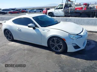 2015 Scion FR-S with VIN JF1ZNAA12F9709707, listed as a IAAI auction lot 41545940 with 107,575 mi miles. Bid and sale history available at carsss.com. Image 1.