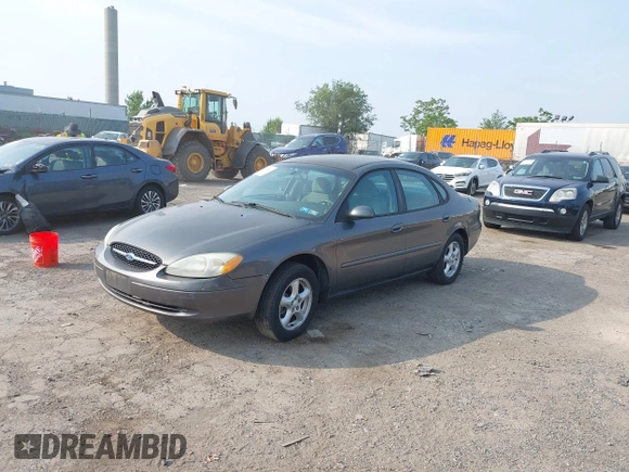 2003 Ford Taurus SE Standard with VIN 1FAFP53203G173180, listed as a IAAI auction lot 42495369 with 129,091 mi miles and . Bid and sale history available at DreamBid. Image 2.