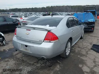 2014 Chevrolet Impala Limited LTZ with VIN 2G1WC5E31E1103210, listed as a IAAI auction lot 41396155 with NaN miles. Bid and sale history available at carsss.com. Image 4.