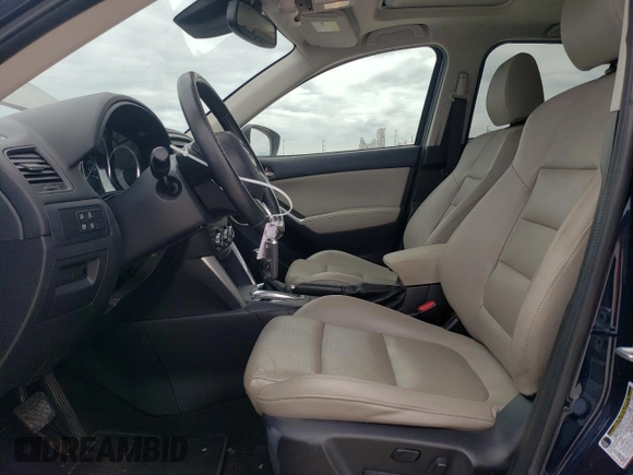 2015 Mazda CX-5 Grand Touring with VIN JM3KE4DY1F0480406, listed as a Copart auction lot 52349945 with 166,515 mi miles and Salvage Title. Bid and sale history available at carsss.com. Image 7.