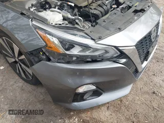 2019 Nissan Altima SL z VIN 1N4BL4EV4KC256015, wystawiony jako IAAI lot #42041439 z przebiegiem 104 888 mil mil oraz . Historia ofert i sprzedaży dostępna na DreamBid. Obrazek 6.
