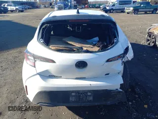 2021 Toyota Corolla Hatchback SE with VIN JTND4MBE7M3141993, listed as a Copart auction lot 73617514 with 20,029 mi miles and Salvage Title. Bid and sale history available at carsss.com. Image 6.