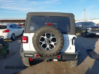 2022 Jeep Wrangler Unlimited Rubicon with VIN 1C4HJXFN4NW123803, listed as a IAAI auction lot 40994742 with 36,156 mi miles and . Bid and sale history available at DreamBid. Image 16.