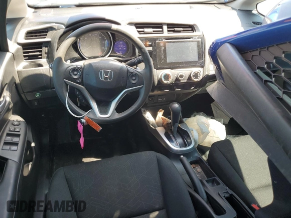 2015 Honda Fit EX-L with VIN 3HGGK5H83FM745753, listed as a Copart auction lot 61916175 with 76,305 mi miles and Salvage title. Bid and sale history available at DreamBid. Image 8.