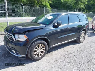 2015 Dodge Durango SXT with VIN 1C4RDJAG4FC795963, listed as a IAAI auction lot 42457196 with 161,800 mi miles and . Bid and sale history available at DreamBid. Image 2.