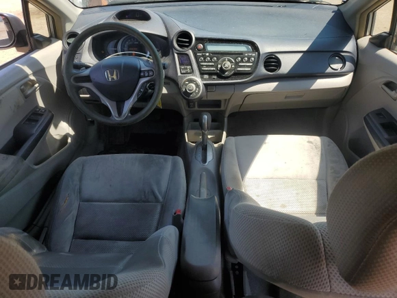 2010 Honda Insight EX with VIN JHMZE2H79AS023173, listed as a Copart auction lot 58087275 with 216,322 mi miles and Salvage title. Bid and sale history available at DreamBid. Image 8.