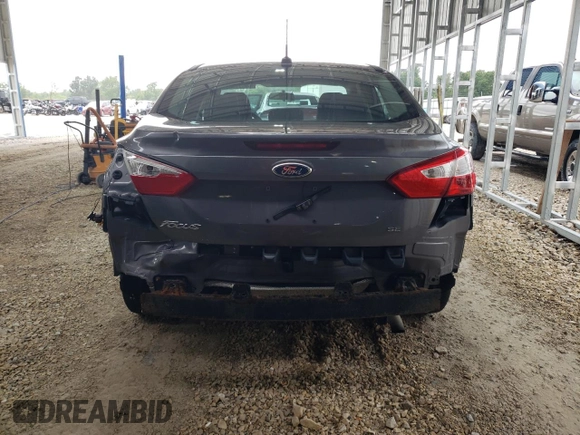 2013 Ford Focus SE with VIN 1FADP3F23DL319295, listed as a Copart auction lot 59927985 with 139,264 mi miles and Salvage title. Bid and sale history available at DreamBid. Image 6.
