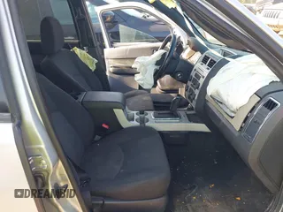 2009 Mercury Mariner z VIN 4M2CU91769KJ21418, wystawiony jako IAAI lot #42378151 z przebiegiem 200 771 mil mil oraz . Historia ofert i sprzedaży dostępna na DreamBid. Obrazek 5.