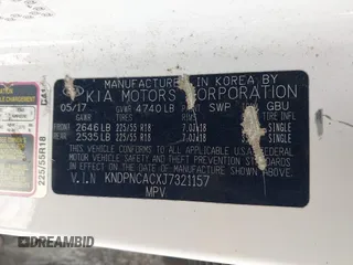 2018 Kia Sportage EX with VIN KNDPNCACXJ7321157, listed as a IAAI auction lot 41918274 with 157,813 mi miles and . Bid and sale history available at carsss.com. Image 9.