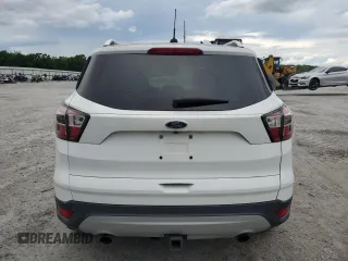 2017 Ford Escape SE z VIN 1FMCU0G99HUA75866, wystawiony jako Copart lot #57274785 z przebiegiem 132 874 mil mil oraz Czysty tytuł • Clean title. Historia ofert i sprzedaży dostępna na DreamBid. Obrazek 6.