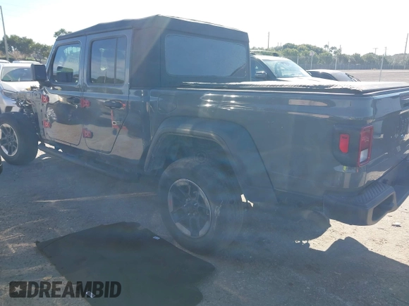 2021 Jeep Gladiator Willys with VIN 1C6HJTAG4ML517715, listed as a IAAI auction lot 41436634 with 21,187 mi miles and . Bid and sale history available at DreamBid. Image 3.