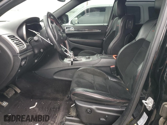 2017 Jeep Grand Cherokee Trailhawk with VIN 1C4RJFLT5HC692439, listed as a Copart auction lot 81093534 with 135,493 mi miles and Salvage title. Bid and sale history available at DreamBid. Image 7.