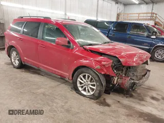 2014 Dodge Journey SXT with VIN 3C4PDCBG2ET188822, listed as a IAAI auction lot 41219215 with 174,053 mi miles. Bid and sale history available at carsss.com. Image 1.