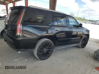 2020 Cadillac Escalade Luxury z VIN 1GYS3BKJXLR241205, wystawiony jako Copart lot #56461705 z przebiegiem 37 818 mil mil oraz Szkody całkowita. Historia ofert i sprzedaży dostępna na DreamBid. Obrazek 3.