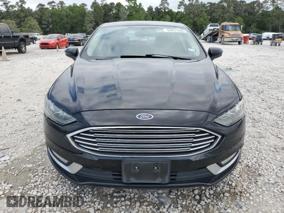 2017 Ford Fusion SE z VIN 3FA6P0H75HR228505, wystawiony jako Copart lot #53251205 z przebiegiem 144 898 mil mil oraz Czysty tytuł • Clean title. Historia ofert i sprzedaży dostępna na DreamBid. Obrazek 5.