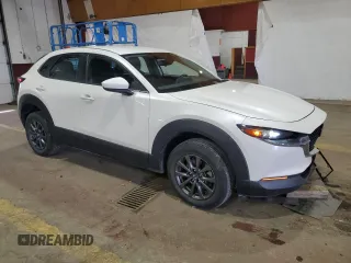 2022 Mazda CX-30 S with VIN 3MVDMBAL9NM410566, listed as a Copart auction lot 50513215 with 26,852 mi miles and Salvage Title. Bid and sale history available at DreamBid. Image 4.