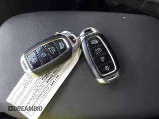 2021 Hyundai Kona SEL with VIN KM8K22AAXMU647635, listed as a IAAI auction lot 41656838 with 36,470 mi miles and . Bid and sale history available at DreamBid. Image 11.