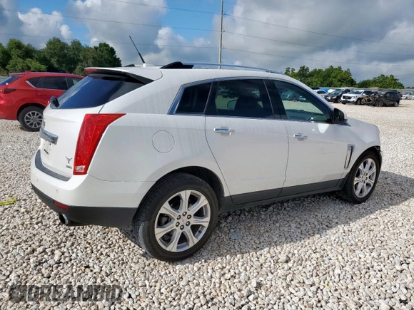 2014 Cadillac SRX Performance Collection with VIN 3GYFNCE39ES687733, listed as a Copart auction lot 62770665 with 151,714 mi miles and Salvage title. Bid and sale history available at DreamBid. Image 3.