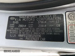 2006 Kia Spectra EX with VIN KNAFE121165250136, listed as a Copart auction lot 67966364 with 105,067 mi miles and Clean Title. Bid and sale history available at carsss.com. Image 12.
